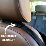 closeup image to the adjustable straps on the headrest to fit in all cars